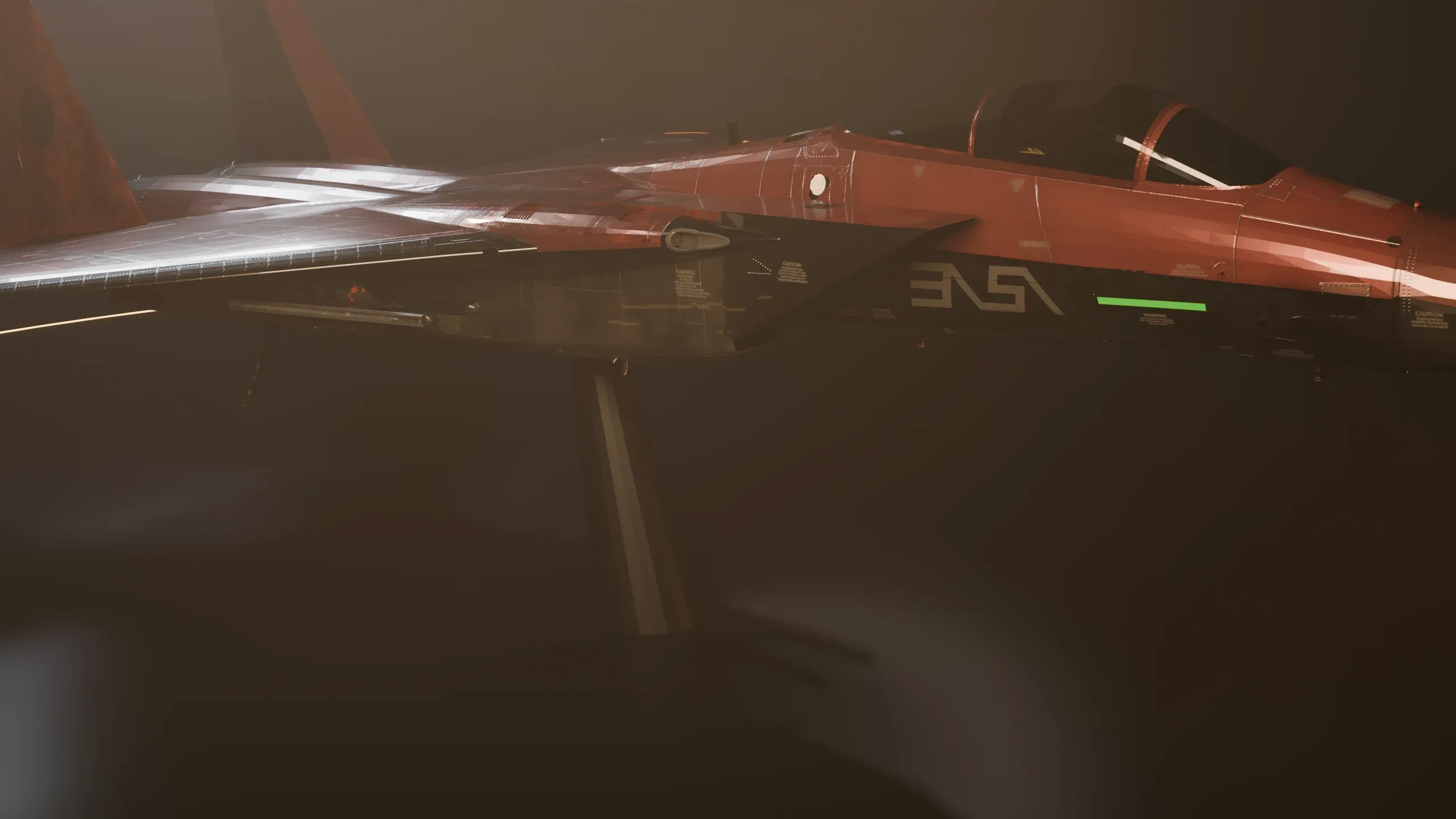 F-15C Eagle in profile under warm hangar light